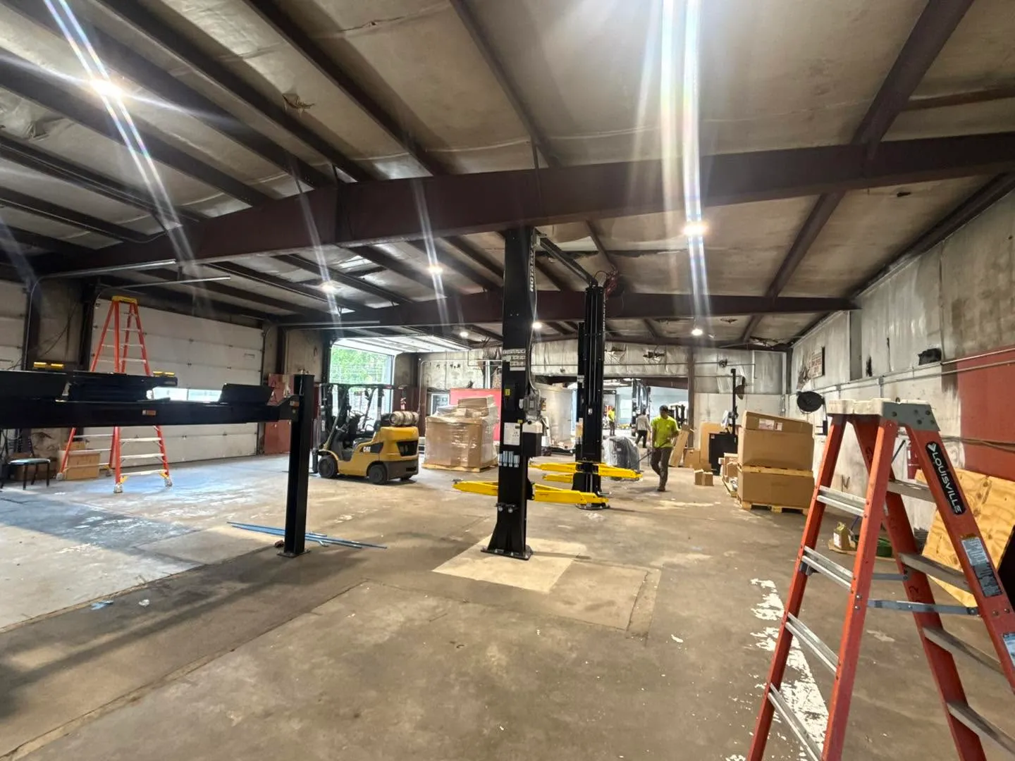 A truck up on the lift during a shop build